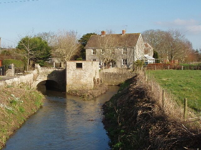 The Old Mill on the River Cam, West Camel View from road bridge over the Cam.