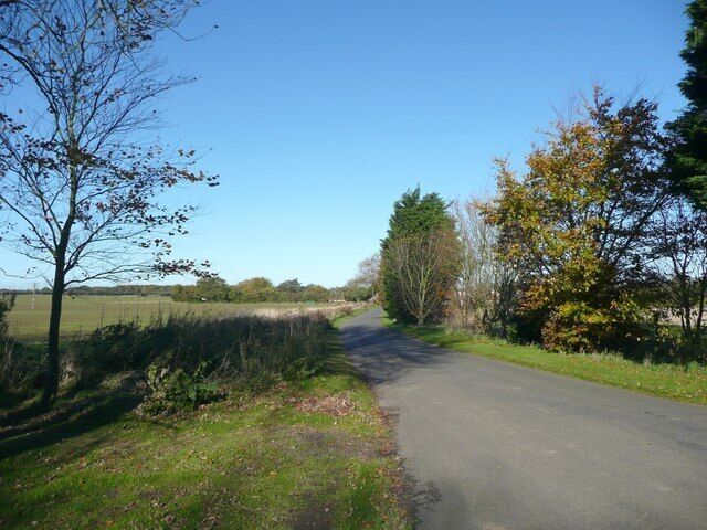 Sheringham Road, West Beckham. Viewed from near the to village sign. This is the 'road to the seaside' - see 405587.