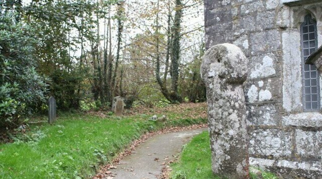 Ancient cross in Warleggan churchyard. Believed to date from the C8th, this cross is understood to have been moved to the churchyard in the 19th century from near Carburrow where it was thought to have been used to mark the path across the moor from Warleggan to Temple.