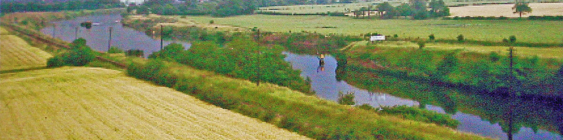 Towards Manchester up the Ship Canal, from Warburton Bridge 1966 View NE towards Partington, Glazebrook and Irlam, with all their Steel and Chemical Works.