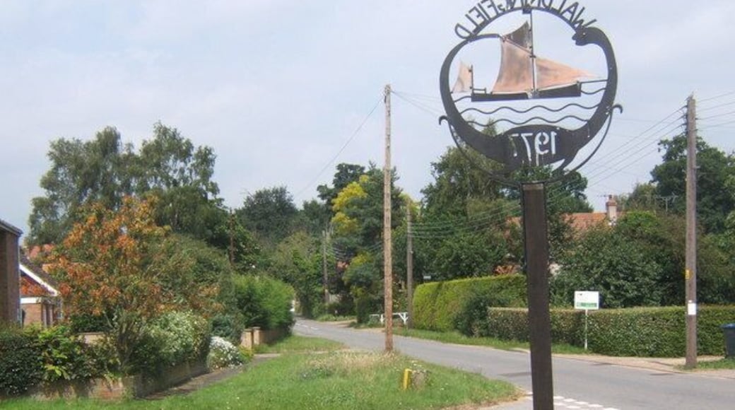 Waldringfield village sign, looking north along School Road Walking through this part of the village, one would be forgiven for questioning the reference to boats and water on the village sign. The estuary of the Deben River is hidden away to the east.