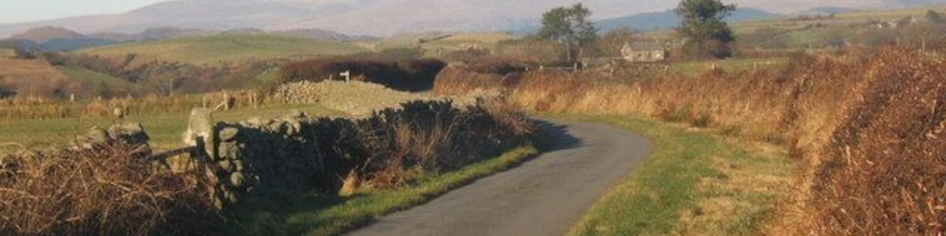 Lane towards Corney from Bootle The whole area seaward of the high ground between Black Combe and Whitfell has a particularly quiet and remote air, including the little villages of Bootle, Corney and Waberthwaite. This lane gives provides good views near the transition between the open fells and the pastoral land towards the coast.