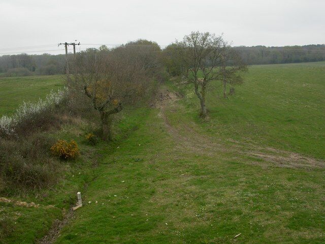 Eastworth, former railway line. Trackbed of the old Salisbury to Dorchester railway, closed 1964; as seen from 1258252. http://history.verwood.org/verwood_station.htm