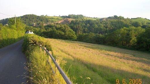 Trusham Quarry. There is a dolerite quarry here - well hidden by the trees. It has won awards for sensitive landscaping. The Teign river flows through the valley.