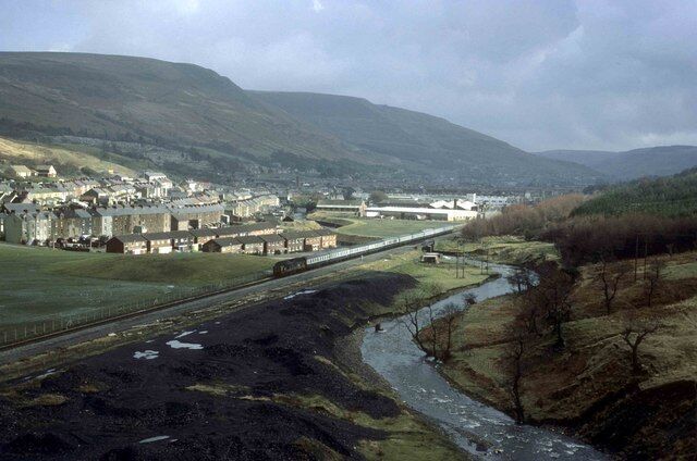 Looking down the Rhonda Valley Taken in February 1977 off the top of a hill near Treherbert I wonder what the present view looks like now. There still appears to be signs of coal mining then in the foreground