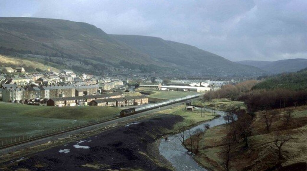 Looking down the Rhonda Valley Taken in February 1977 off the top of a hill near Treherbert I wonder what the present view looks like now. There still appears to be signs of coal mining then in the foreground