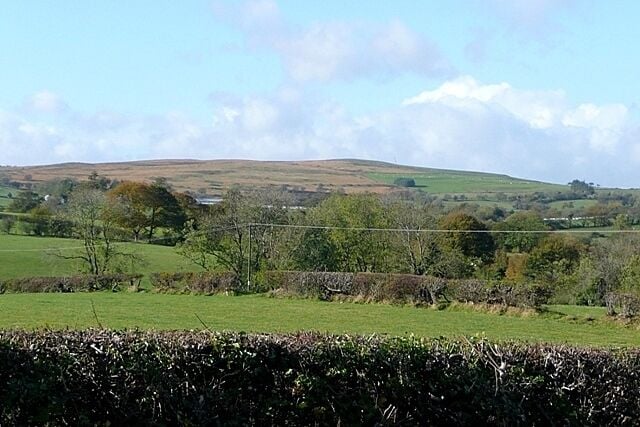 Farmland near Aberclawdd Sheep farming in small irregular fields, with the moorland of Mynydd Argoed SO0498 beyond.