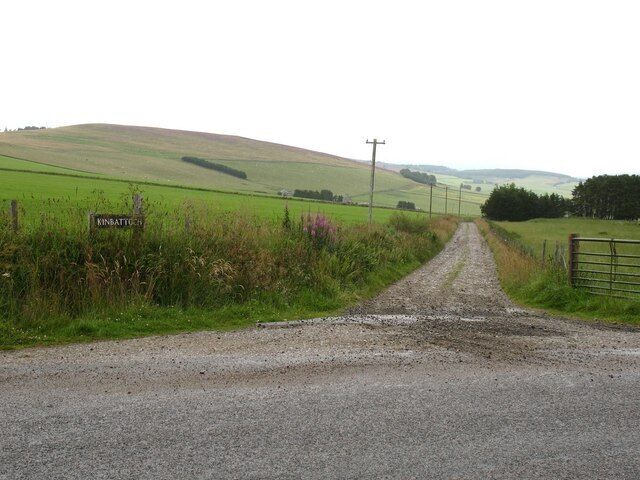 Farm road to Kinbattoch The junction of the public road with the track to Kinbattoch farm.