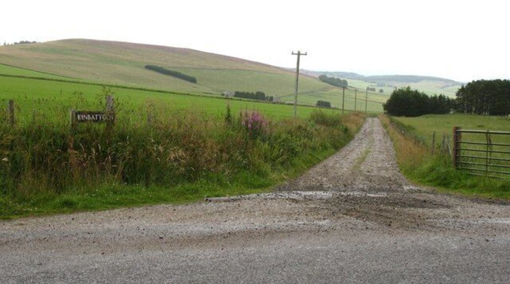 Farm road to Kinbattoch The junction of the public road with the track to Kinbattoch farm.