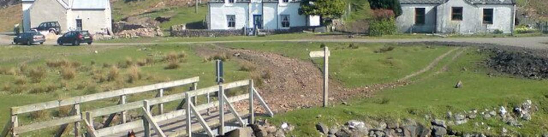 Bridge, Upper Toscaig Marked as a footbridge on the OS 1:25,000, this bridge, built by the army, is sturdy enough to take vehicular traffic, unauthorised access is restricted by a lockable 'knockdown' bollard.
