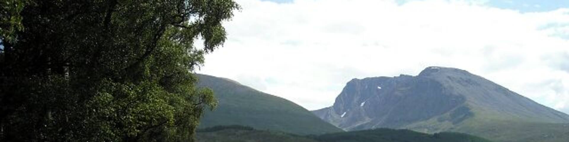 Minor Road Near Torlundy The north face of Ben Nevis can also be seen.