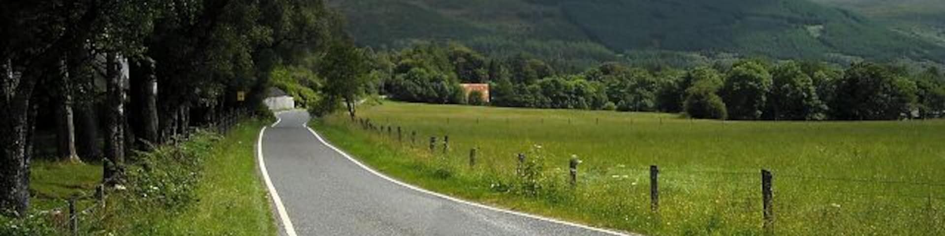 Minor Road Near Torlundy The north face of Ben Nevis can also be seen.