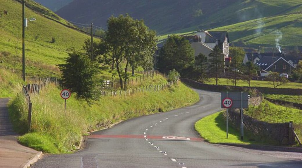 The A685, Tebay The road leaving the main part of the village as it makes its way towards Kendal. The buildings ahead are just above the site of the former railway station. The former Junction Hotel is prominent. The narrow valley is that of the River Lune. It separates the Howgill Fells to the left from the foothills of the Lake District to the right. As well as the road, the M6 and the West Coast Mainline run through this gap in the hills.