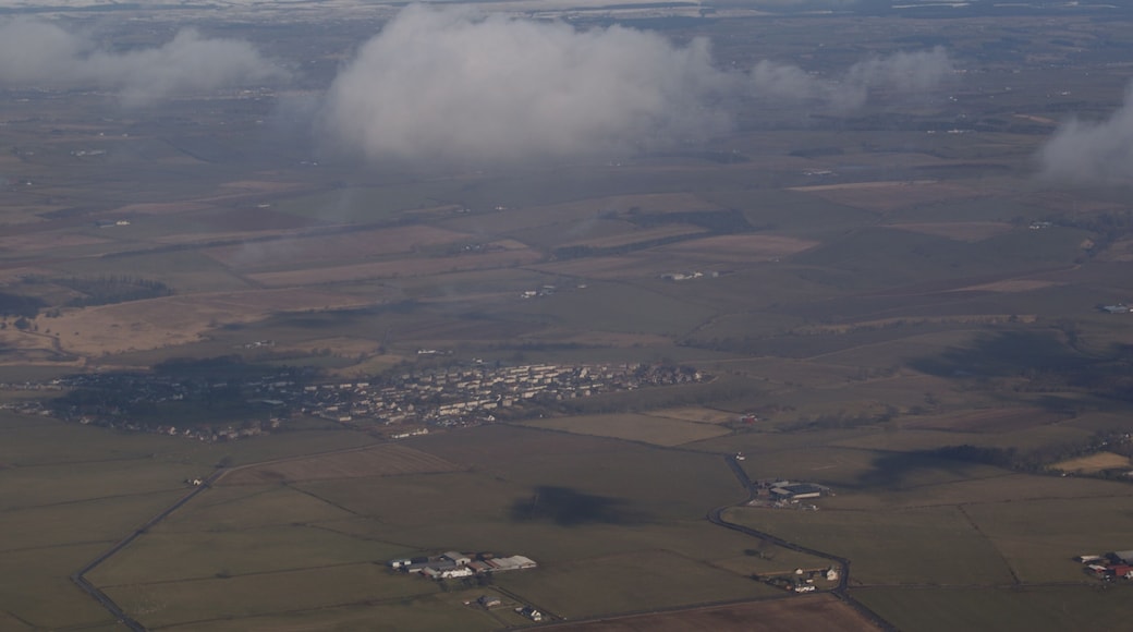 Tarbolton from the air Viewed from a Ryanair flight which has just taken off from Prestwick Airport. The farm in the centre foreground is West Carngillan.