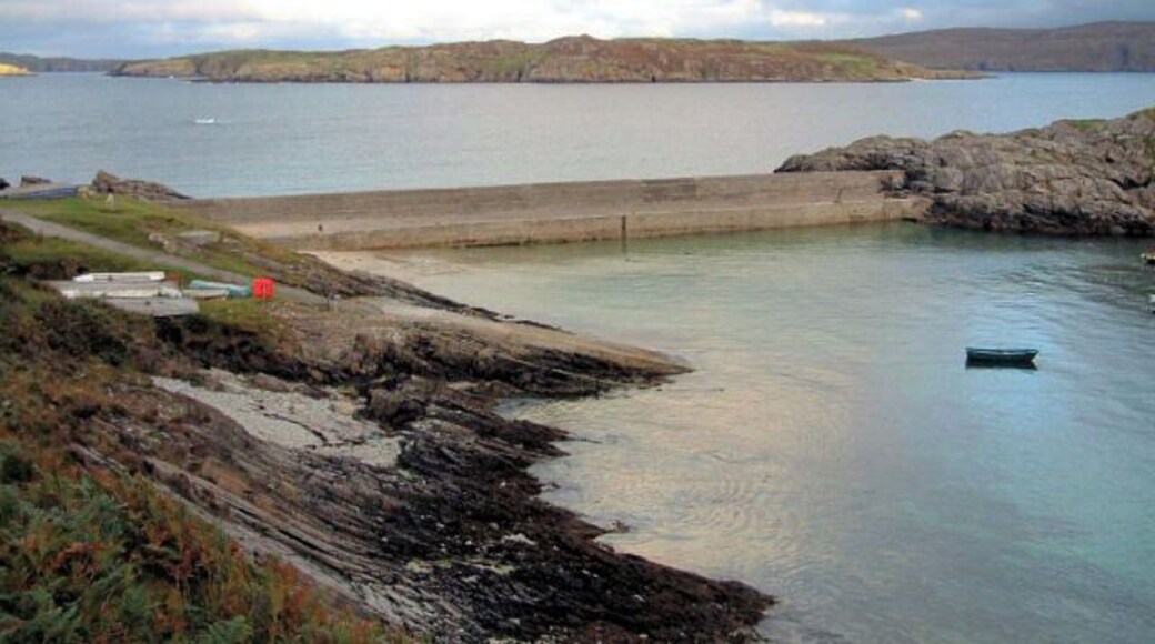 Talmine Pier The pier connects the mainland with the Eilean Creagach, forming a small harbour. A steep slipway provides a launching point for dinghies.