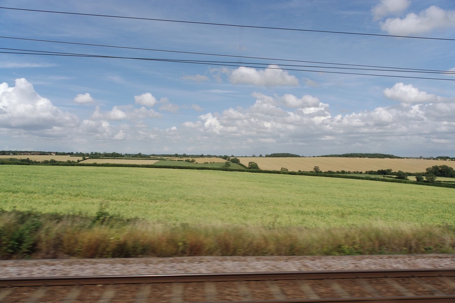 View out of the east-side window of an East Coast service between Peterborough and Grantham. I think this is near Swayfield, about 15km south of Grantham, looking north/east.