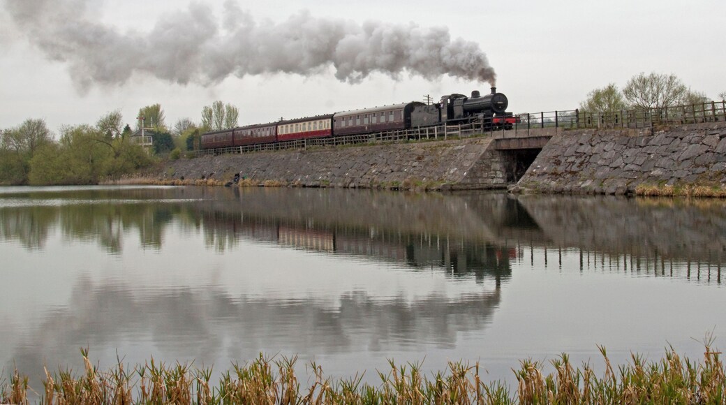 Preserved steam locomotive S&DJR 7F 2-8-0 No. 53809 crossing Butterley Reservior at the Midland Railway - Butterley heritage railway.