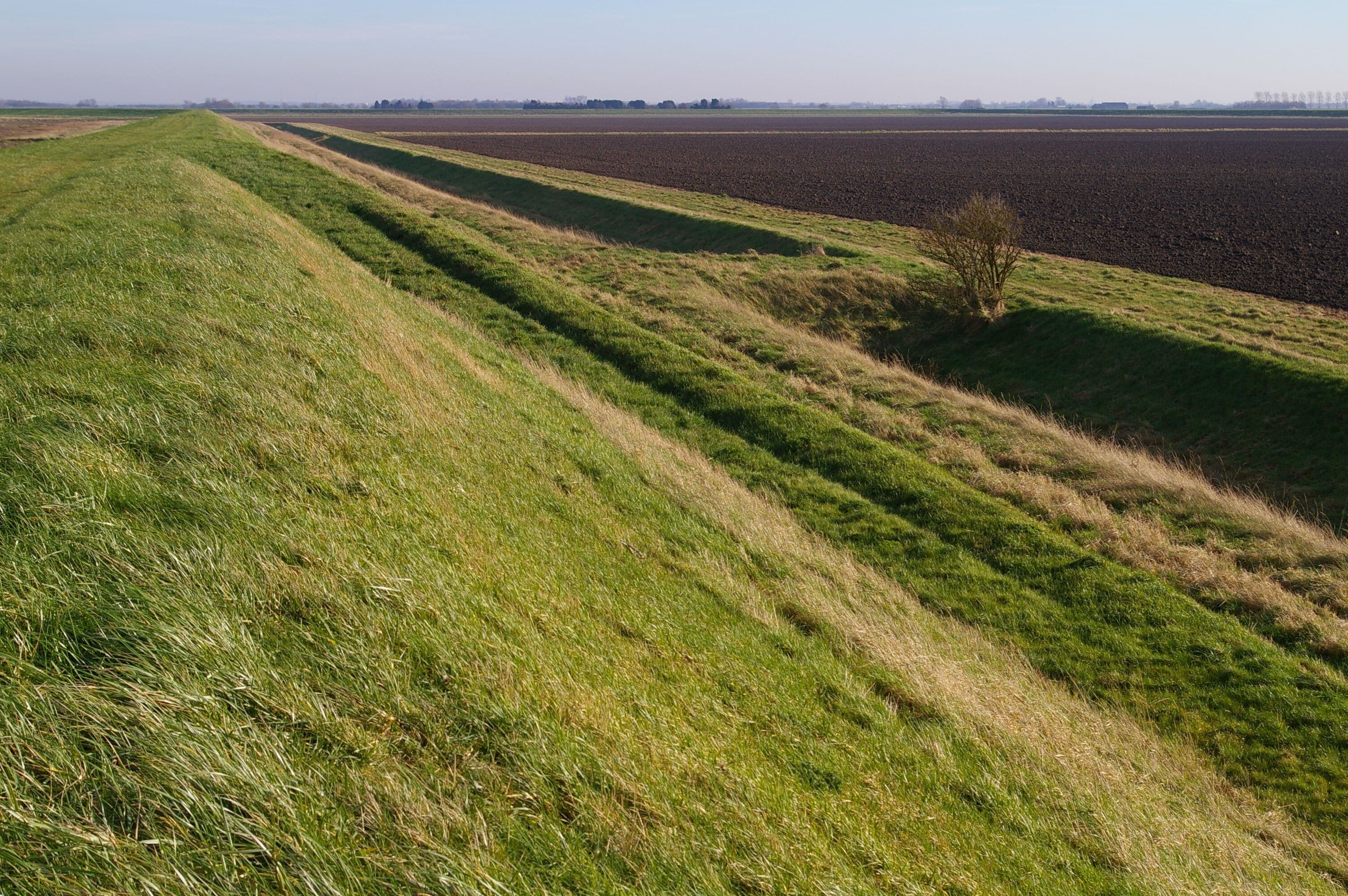 Causeway across a drain This small causeway provides access to the sea bank from the adjoining field. Or possibly vice versa; it's hard to be sure.