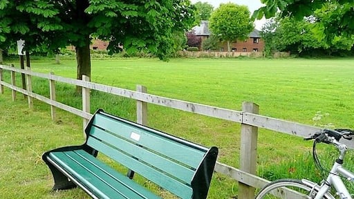 Bench at Mortimer Common. This bench adjacent to the common is a convenient place to sit and eat ones lunch and contemplate the view of the church opposite. The bench commemorates ...? Have a look 1315428