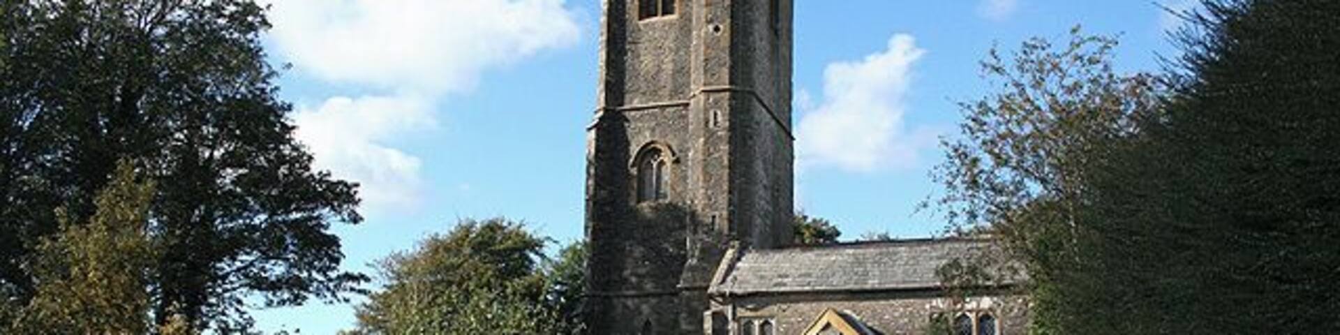 Stoke Rivers: St Bartholomews church Looking roughly north. The church was mostly erected in the 15th century but was extensively rebuilt in 1832. Allowed to decay in the mid 20th century, it is now restored again