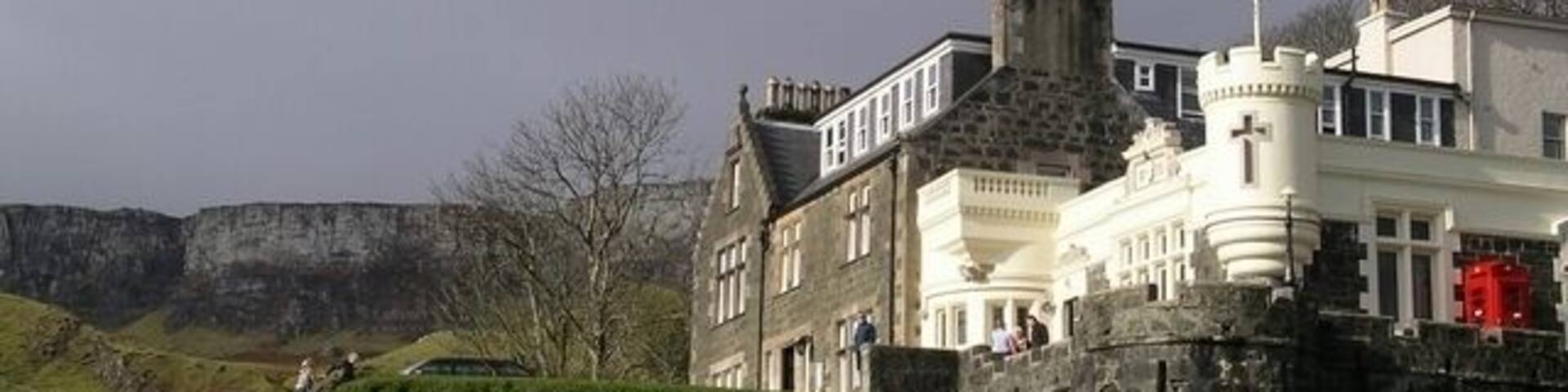 Flodigarry Hotel, Skye. The crags of Sron Vourlinn in the background.