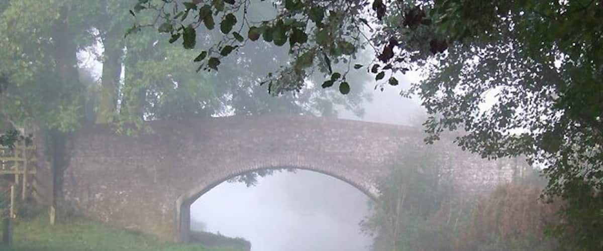 Misty Morning at Cavan's Bridge, Staffordshire and Worcestershire Canal The sun was already attempting to disperse the mist, and as the photograph was taken, did shine briefly and feebly onto the bridge, from the left. Wonderful conditions for "misty" pictures lasted about another fifteen minutes, then suddenly the mist was gone! The bridge is also called Swivel Bridge.