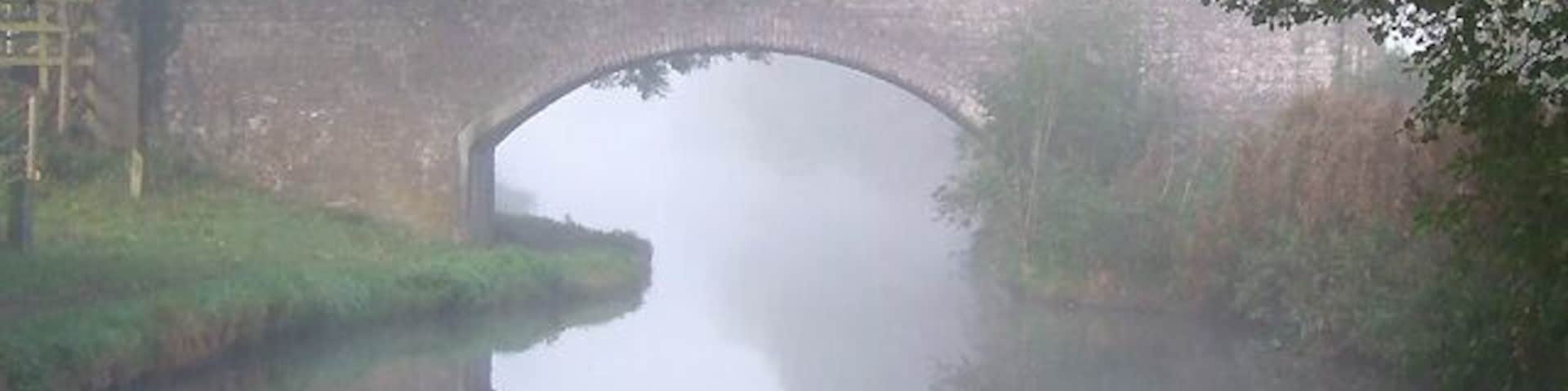 Misty Morning at Cavan's Bridge, Staffordshire and Worcestershire Canal The sun was already attempting to disperse the mist, and as the photograph was taken, did shine briefly and feebly onto the bridge, from the left. Wonderful conditions for "misty" pictures lasted about another fifteen minutes, then suddenly the mist was gone! The bridge is also called Swivel Bridge.