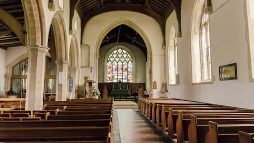 The church dates from the 13th century onwards, with several restorations in the 19th century. It consists of a western tower, nave with south porch, clerestory and north aisle, chancel with chapel, and vestry. The unbuttressed tower dates from the 13th century and is topped by a two tier lantern of lead-covered wood. The tower is rendered, with a battlemented parapet. There is also a bellcote at the east end of the nave. The nave has a clerestory to the north side, and the north arcade is of five bays with octagonal piers. There is a two bay arcade to the north chapel. The north aisle has a late medieval roof with large arched braces, but the roof to the north Chapel is somewhat earlier. There are two fonts, one of which is Norman. The pulpit dates from the early 17th century, and there is also a fine wooden lectern from circa 1500, with lions at the foot. There is a two manual organ which was replaced in 1985.