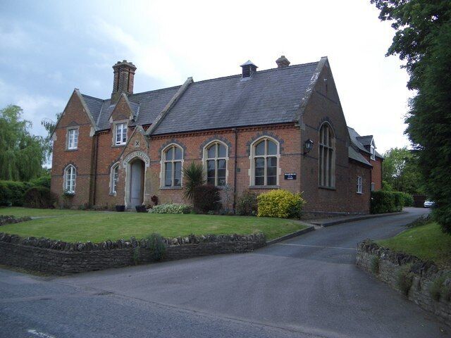Former Police Station at Sharnbrook As can be seen from the inscription over the doorway this solid fine looking Victorian building with polychromatic brickwork detail was once the village police station, now in alternative ownership.