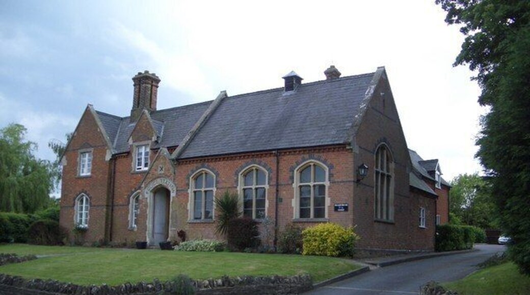 Former Police Station at Sharnbrook As can be seen from the inscription over the doorway this solid fine looking Victorian building with polychromatic brickwork detail was once the village police station, now in alternative ownership.