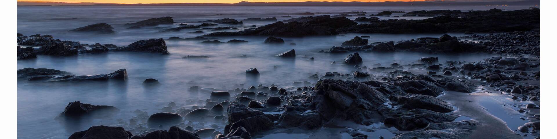 sunrise on Shanwick beach, a very still and enjoyable experience.
Shandwick is at the end of the Great Glen fault and famed for fossils, although in a morning like this you can feel the history commune with the force of nature
