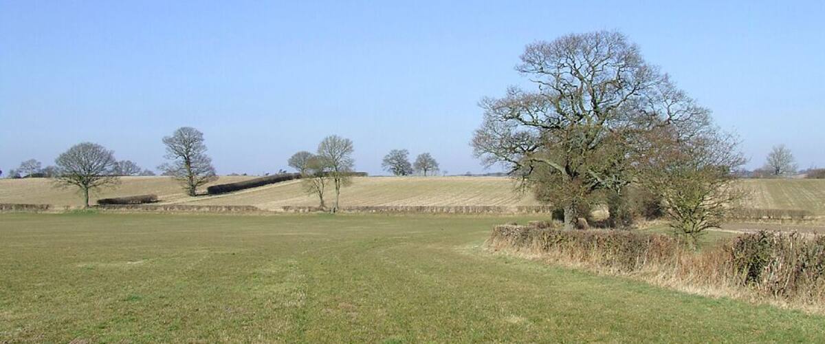 Farm land near Seisdon, Staffordshire Looking towards land near Blakeley Pool Farm. Grass and crop growth is a month or more behind the usual because of an extended cold winter, apparently the coldest for thirty one years.