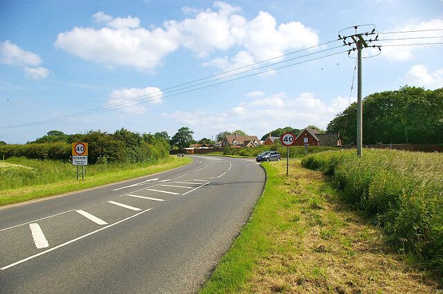 Scratby Road and Thoroughfare Lane junction The car is emerging onto Scratby Road from Thoroughfare Lane. Scratby Hall is behind the clump of trees to the right of the picture; in the years 1948-1986 it was a school for boys, named Duncan Hall School  See www.home.earthlink.net/~duncanhallschool