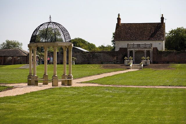 Pavilion at alled garden, Old Somerley house. The house seen is named Old Somerley. This large walled garden lies next to it. It was opened to the public by Lord Normanton during the 2009 Ellingham Show. It seems that the garden is in the process of being restored, since the paths and the central feature are not present on earlier aerial views. The stone steps in front of the house are also new. It appears the garden is available for corporate events and marriage receptions. See also 1433741.