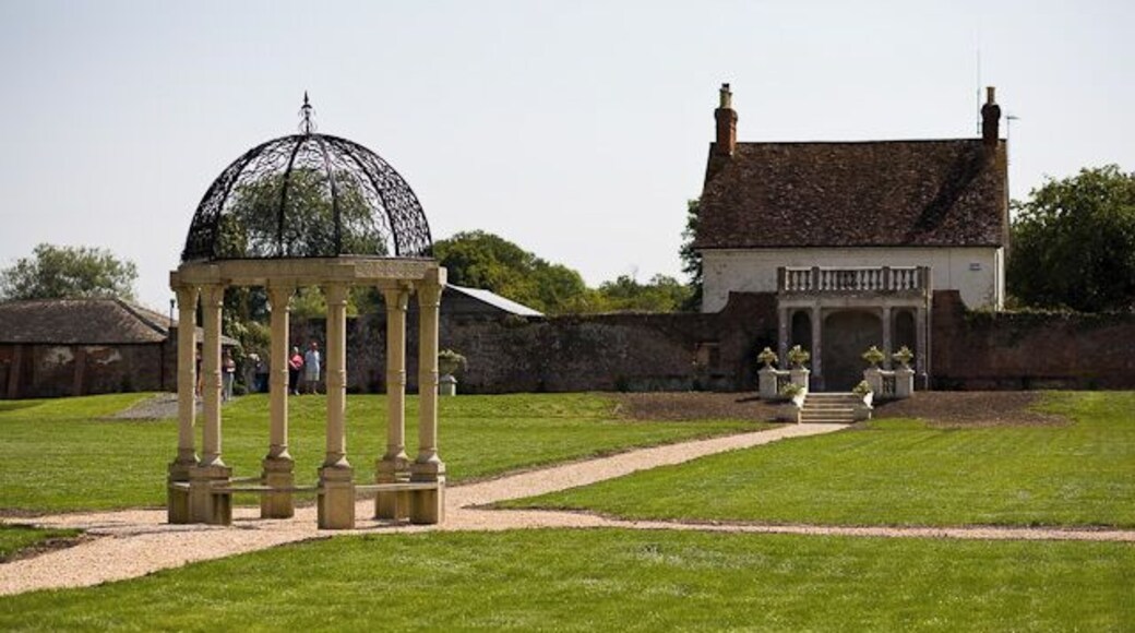 Pavilion at alled garden, Old Somerley house. The house seen is named Old Somerley. This large walled garden lies next to it. It was opened to the public by Lord Normanton during the 2009 Ellingham Show. It seems that the garden is in the process of being restored, since the paths and the central feature are not present on earlier aerial views. The stone steps in front of the house are also new. It appears the garden is available for corporate events and marriage receptions. See also 1433741.