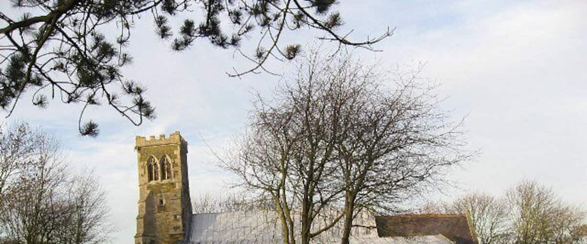 The Parish Church Of All Saints Saltfleetby All Saints. The tower really does lean away from the church, as in the photograph. A fillet has been inserted between the tower and the church roof to keep the interior watertight. Saltfleetby St. Clement and Saltfleetby St. Peter are separate hamlets in the area, distinguished by the Saint to whom their churches are dedicated.