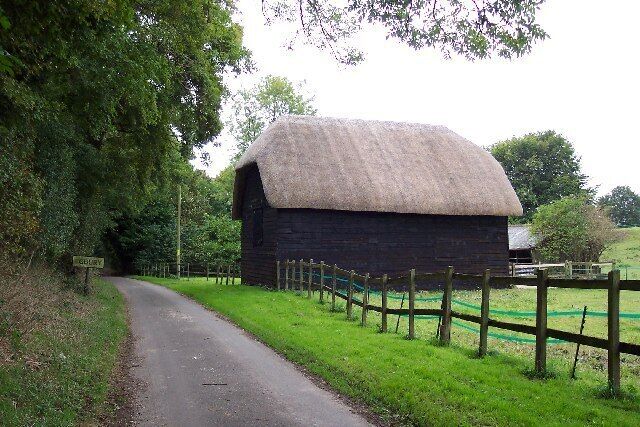 Thatched barn. A thatched, weatherboarded barn at the north end of Egbury village.