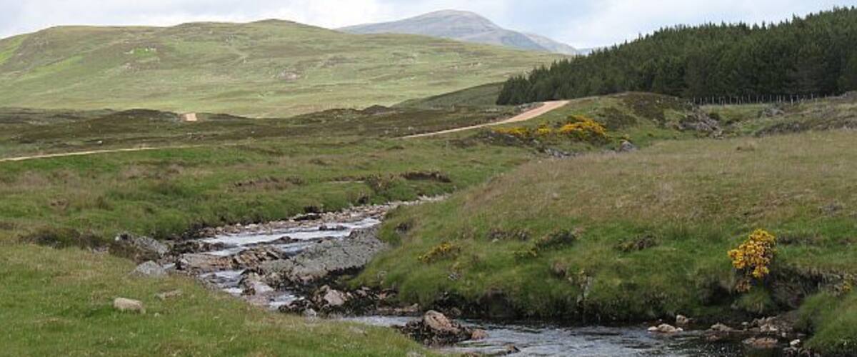 Black Water The river near Dalbreak with a very distant Ben Armine in the background.