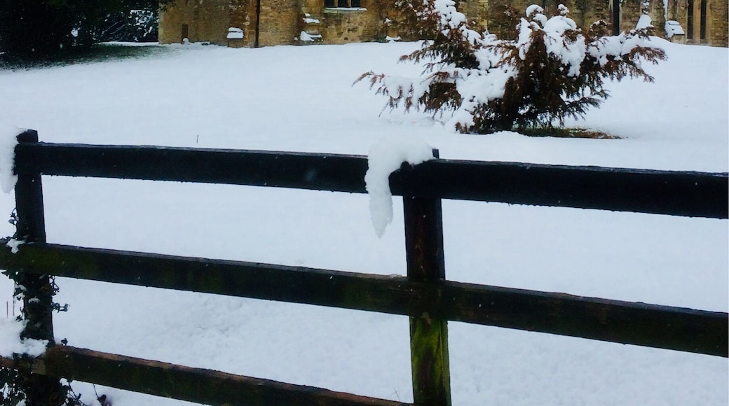 A Very Happy Xmas 2017 .Classic scene of Roade church in the snow, standing proud ,