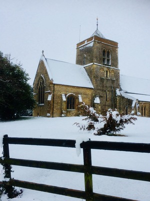 A Very Happy Xmas 2017 .Classic scene of Roade church in the snow, standing proud ,