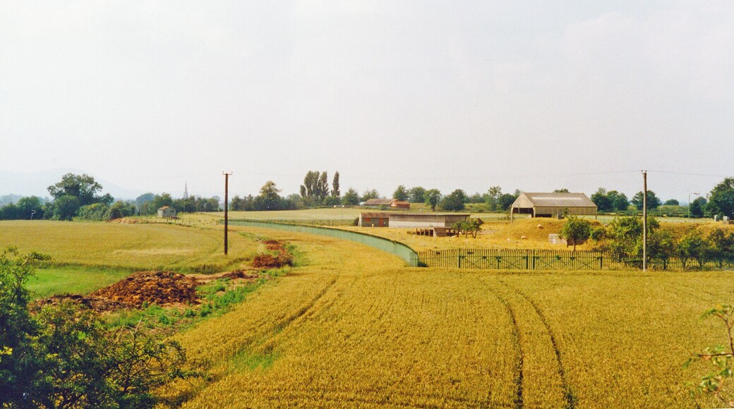 Site of former Oil Depot on Ashchurch - Malvern line at Saxon's Lode by River Severn, 1997. View NW towards Malvern, on the former Midland Railway Ashchurch - Great Malvern branch, closed to Upton-on-Severn 1/7/63 (Upton - Malvern 1/12/52). The Depot was supplied mainly by tankers on the River Severn, but was connected to the railway, some track of which is still visible.