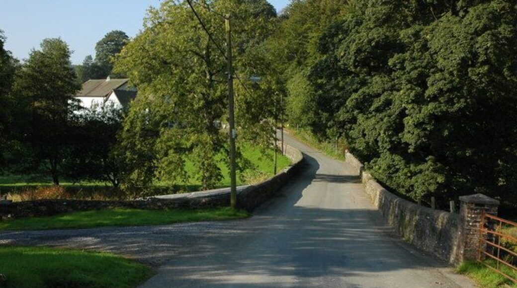 Road through Caio The white building through the trees on the left is the chapel.