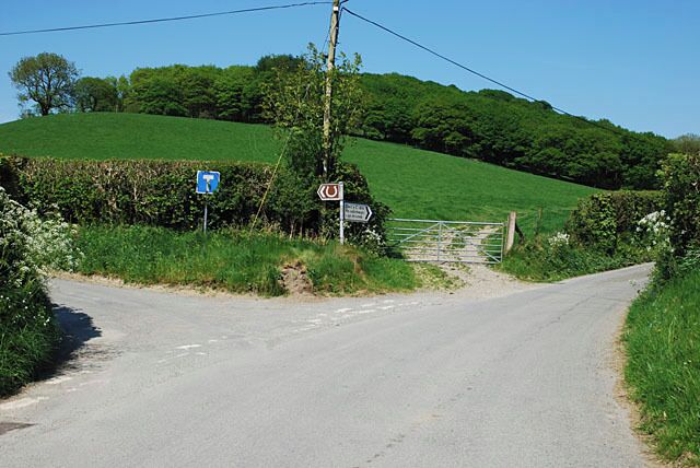 Road junction at Llandre The road on the right continues to Bwlch y Rhiw, thence to the Tywi valley and Llyn Brianne. The lane on the left serves farms up the Managoed valley, including, as the horseshoe shows, some riding establishments.