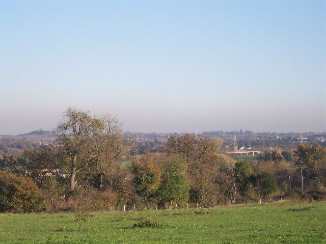 View from Ham Hill, Powick. Supplementary. Wonderful view from this high spot.On the left on the skyline is Crookbarrow Hill SO8752 with its chestnut tree on the top. On the right of the picture is the "Carrington Bridge" taking the southern relief road over the River Severn