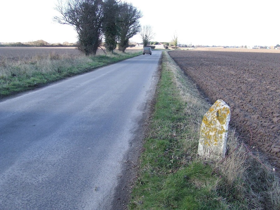To North Walsham 13. Old milepost on what was the A.149 near to Potter Heigham, Norfolk. For close up view see 1732619 For more info on the post see http://www.milestonesweb.com/sites/tg404197.htm do have a look at their home page.