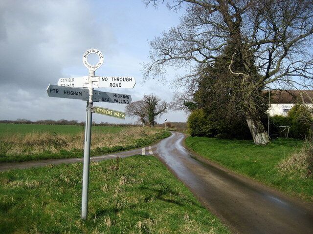 Signpost near Rookery Farm A signpost in the Potter Heigham area, that also indicates directions for Weavers' Way walkers.