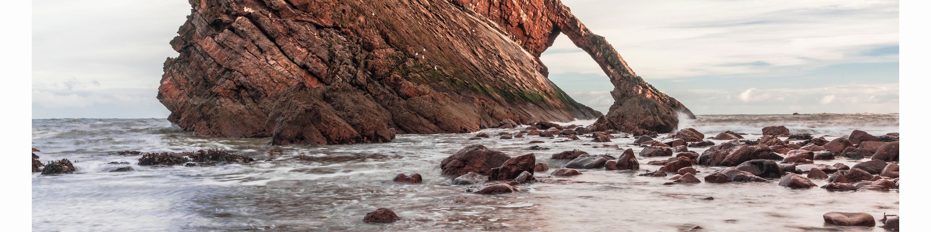 a visit to the cost to see the bow fiddle rock is worth it with the dramatic coastline