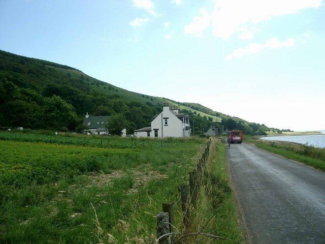 Seafield. The bus is just passing - bus times are to match the ferry, so this will have left Brodick after the arrival of the early afternoon ferry.