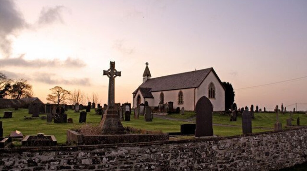 Parish Church, Llanbadarn Trefeglwys I became aware of this site while browsing Geograph. The heavily-restored church is unremarkable, but the massive circular churchyard is spectacular, and characteristic of a very early foundation. Allegedly the church was founded in the 6th century, although this was probably a sacred site long before that. As the sun sets over Ireland, it certainly evokes the "Age of the Saints".