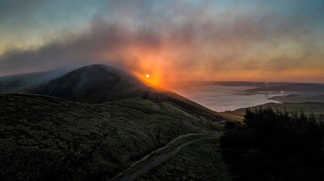 Sunrise behind Mam Tor in the Peak District, Derbyshire, England, taken with a Mavic Pro drone with the cloud inversion in the Hope Valley behind.